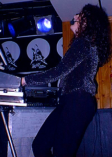 Jane Milliken on stage. Photo by: © www.thewolf.ca